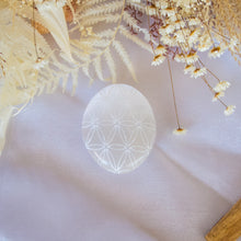 Load image into Gallery viewer, Flower of Life Etched Selenite Palm Stone, for Purification & Protection